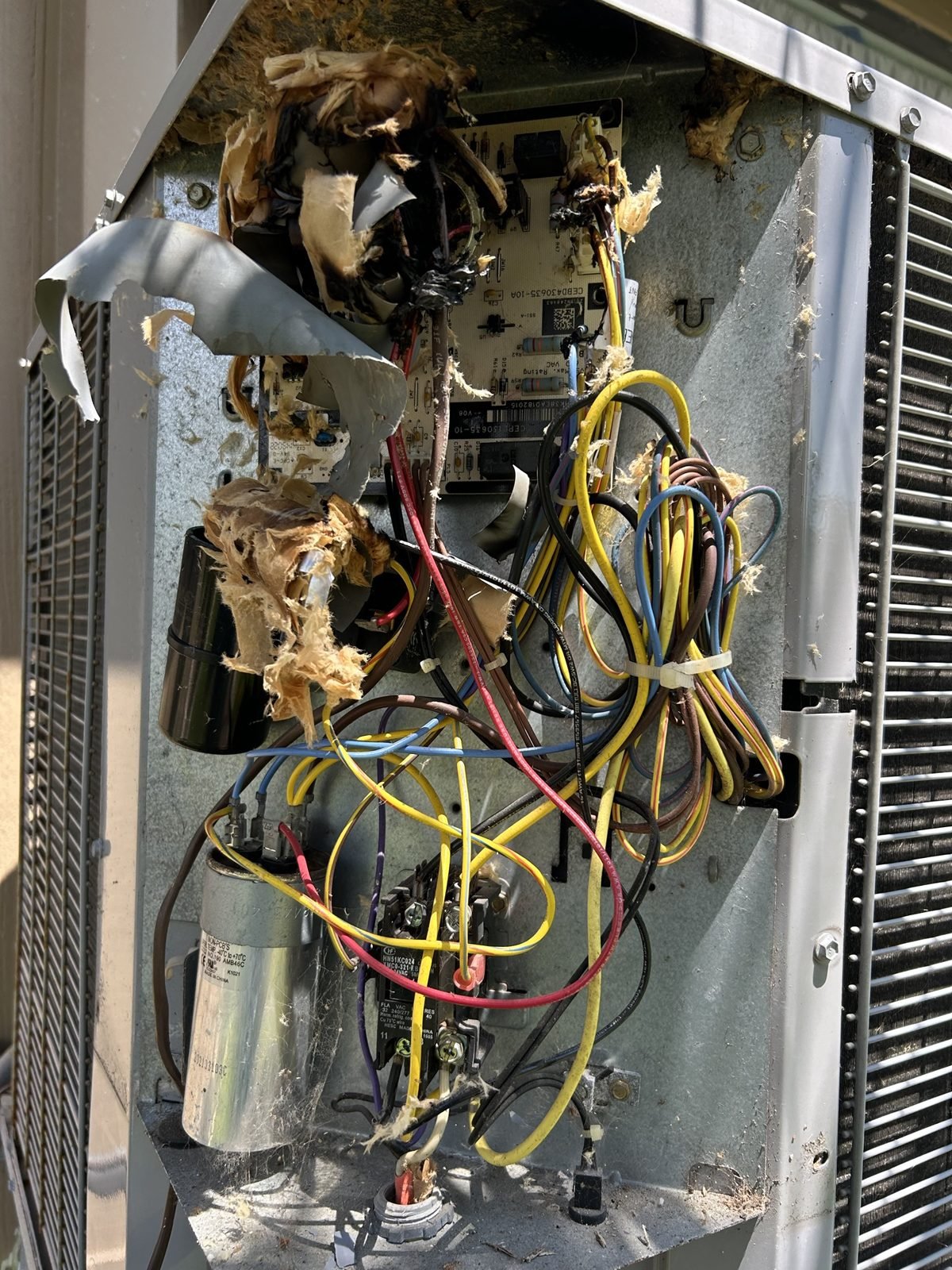 A hard start kit & a capacitor that gave up at the same time. It did not go quietly. Both replaced, wiring redone, unit back on the same day.