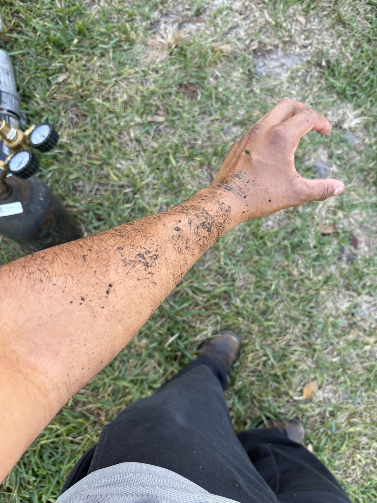 My arm after a drain line. Some clogs do not come out with a vacuum. This one took nitrogen & a step back.